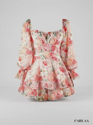 Combinaison rose vaporeuse fleurie à volants femme